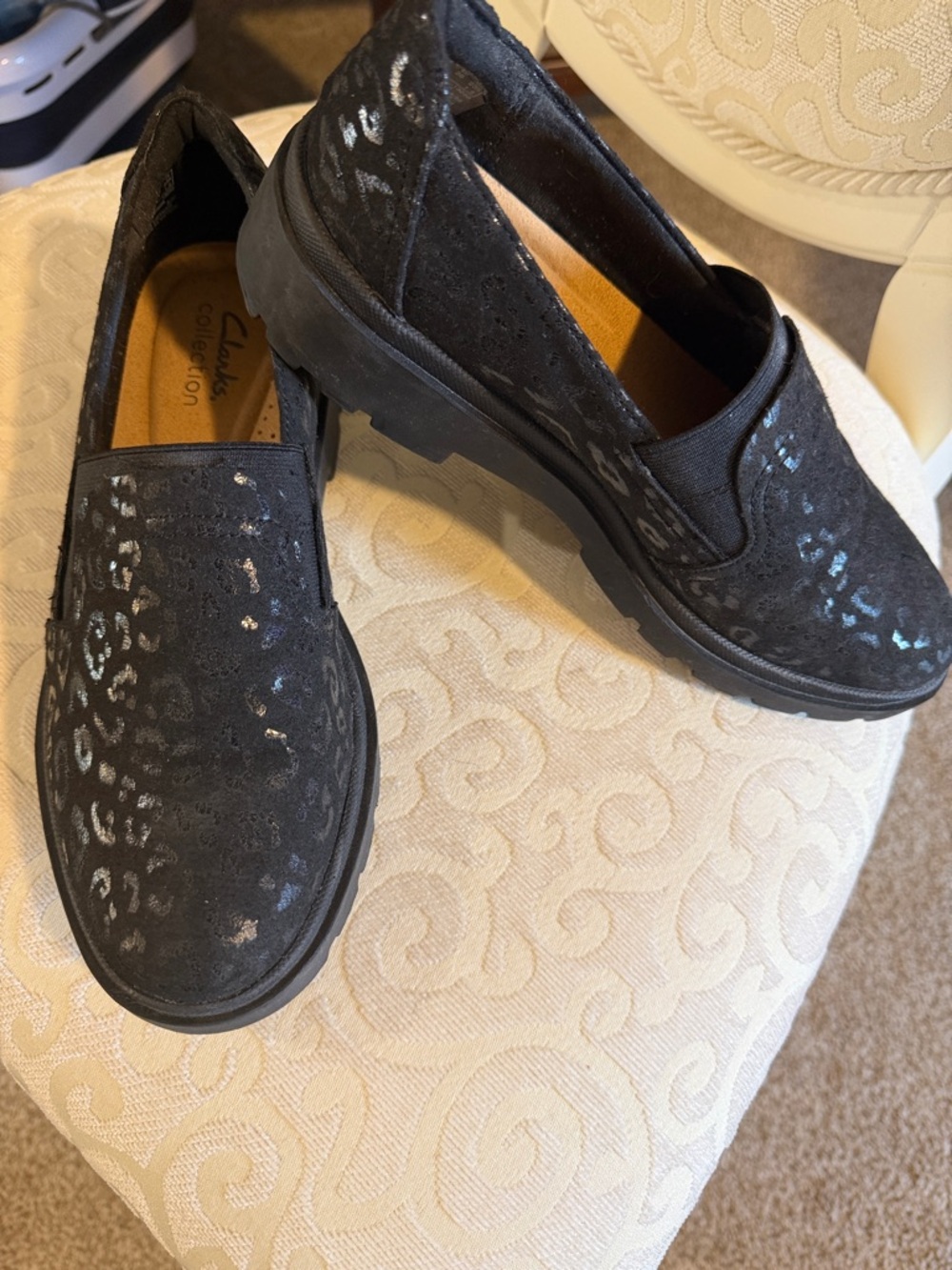 Clarks Black Slip-On Loafers with Subtle Metallic Accents